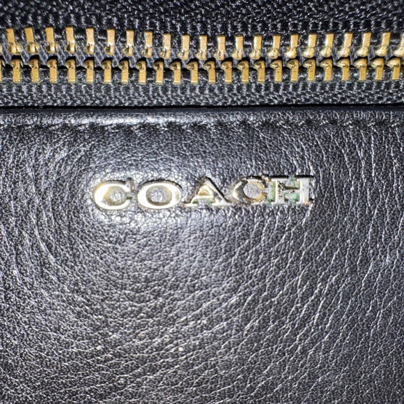 Coach Accessories - GUC: Coach Black Leather Wristlet with black and white sides!